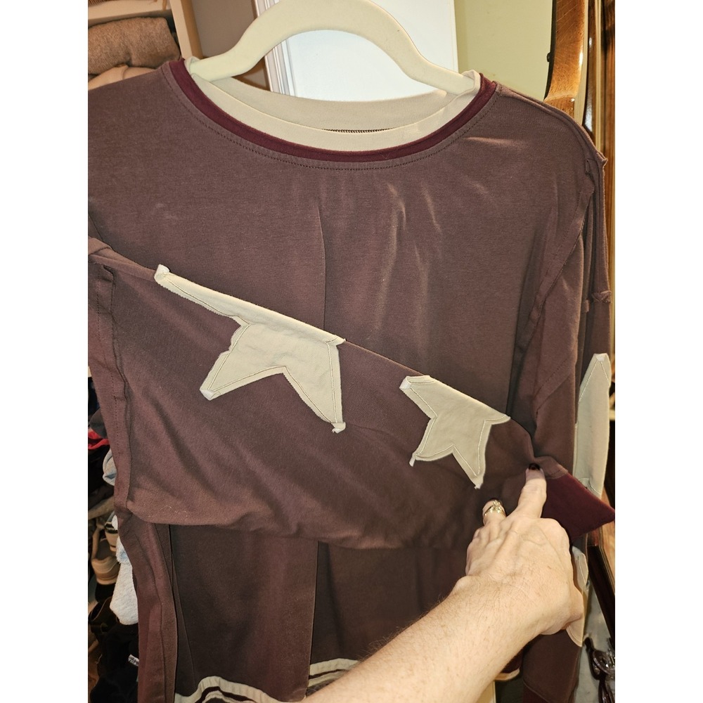 Viral Long Sleeve Soft Knit Shirt With Stars Down The Arms. Raw Edges.